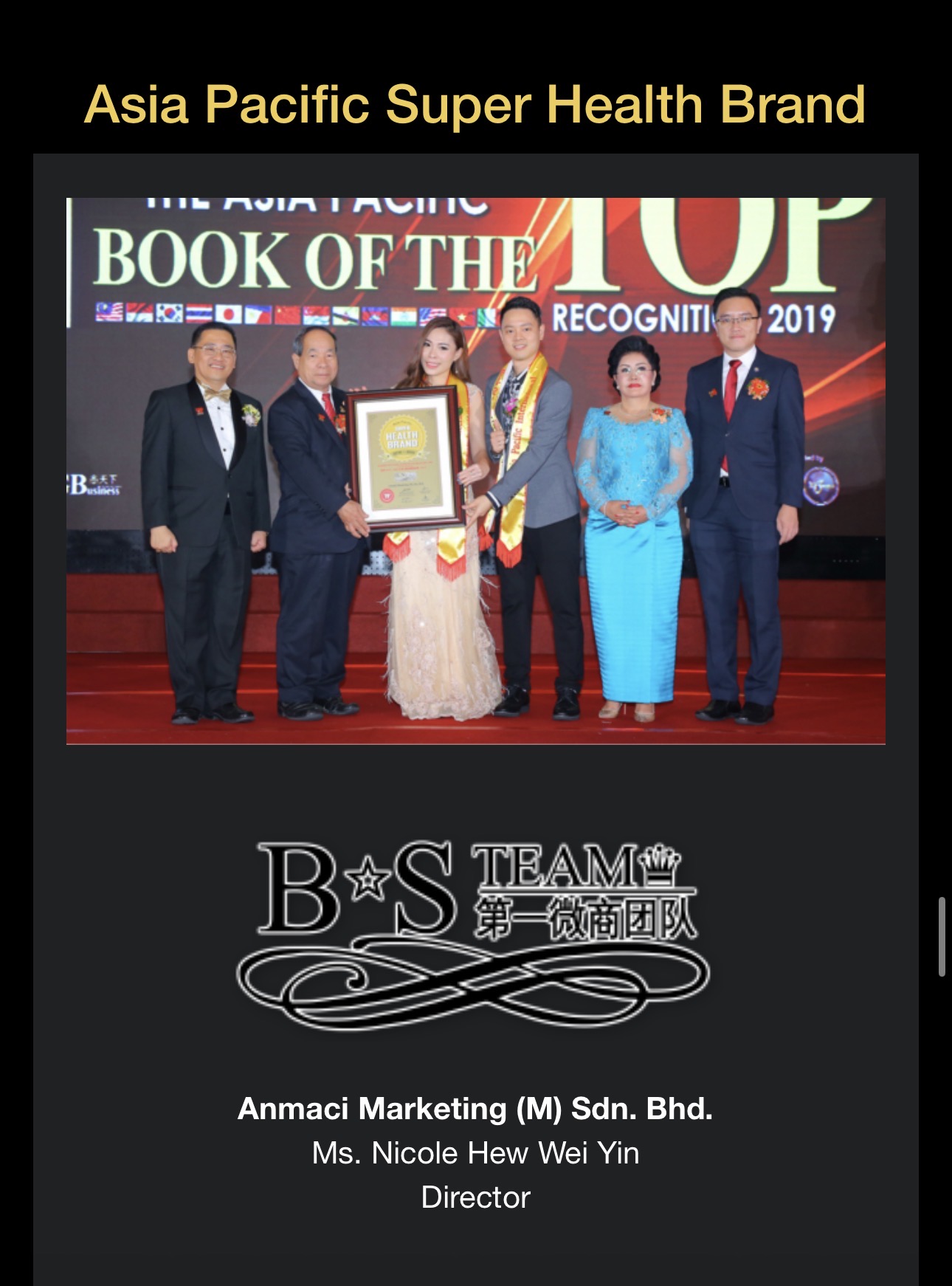 Nicole Hew receiving the Asia Pacific Super Health Brand recognition